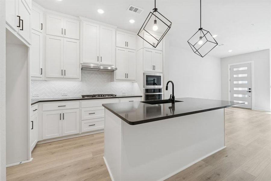 Furnished interior view inside a new home in Hillside at Las Colinas, Irving (Image 7). Furnished interior view inside a new home in Hillside at Las Colinas, Irving (Image 7).