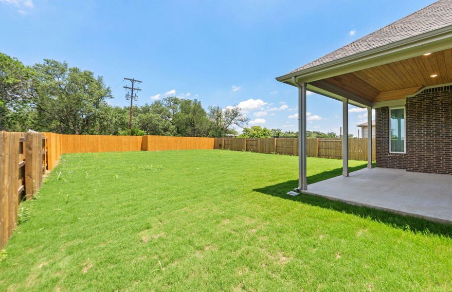 Exterior details and patio area of a home in 6 Creeks, Kyle (Image 20).
