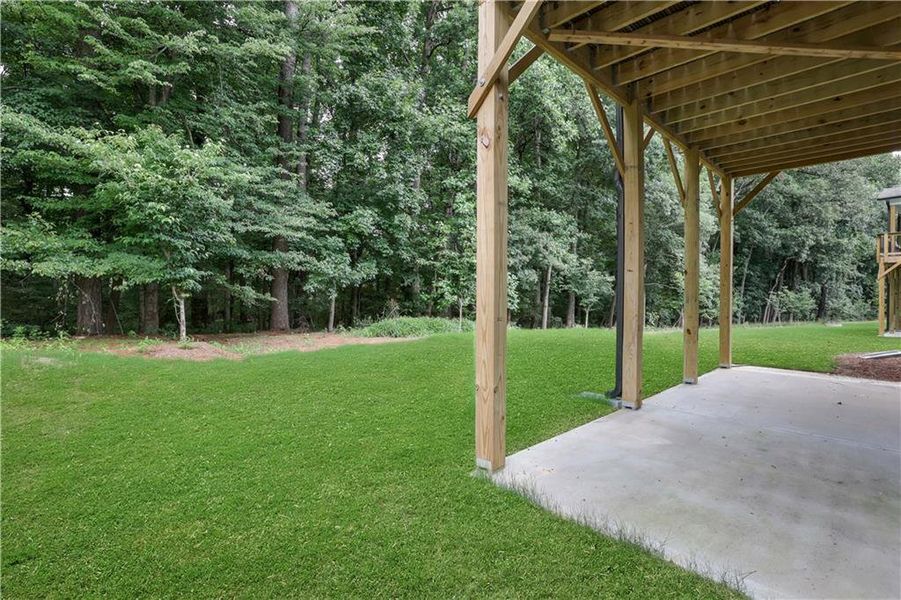 Exterior details and patio area of a home in The Paddocks at Doc Hughes, Buford (Image 31). Exterior details and patio area of a home in The Paddocks at Doc Hughes, Buford (Image 31).