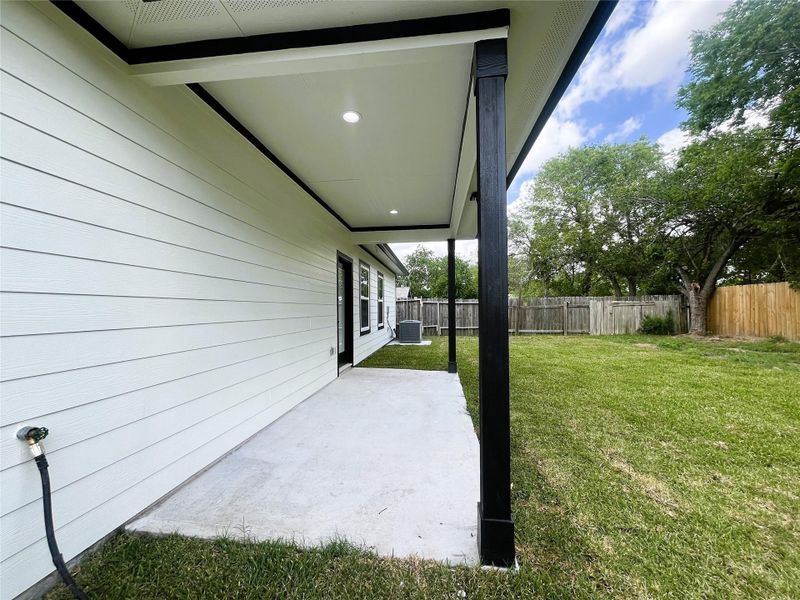 8914 Ivy Spring Ln covered patio south 8914 Ivy Spring Ln covered patio south