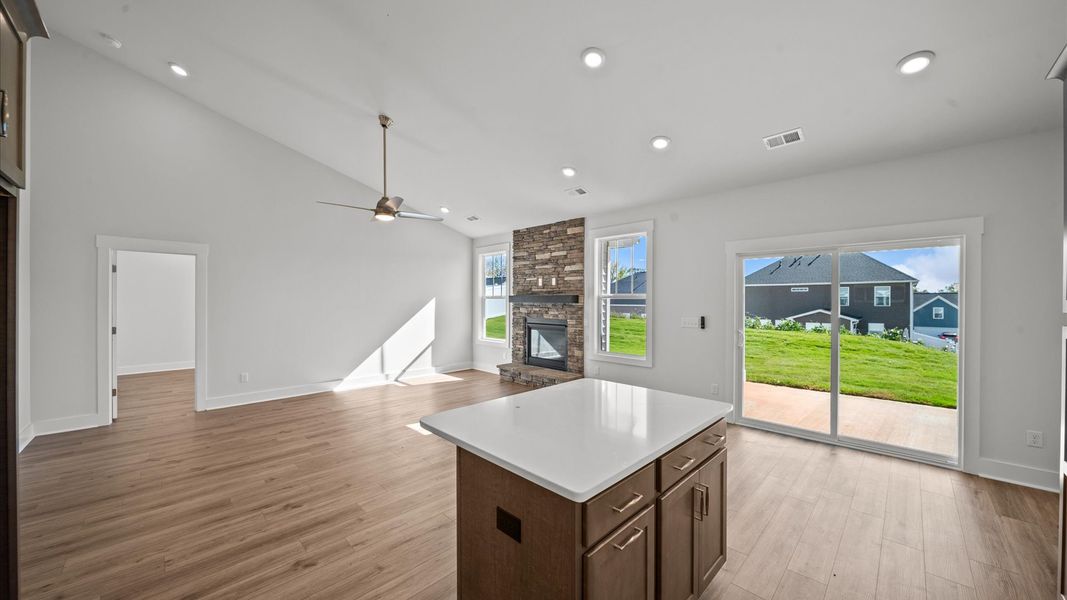 Highly functional kitchen offering a refined look and practical island at the center