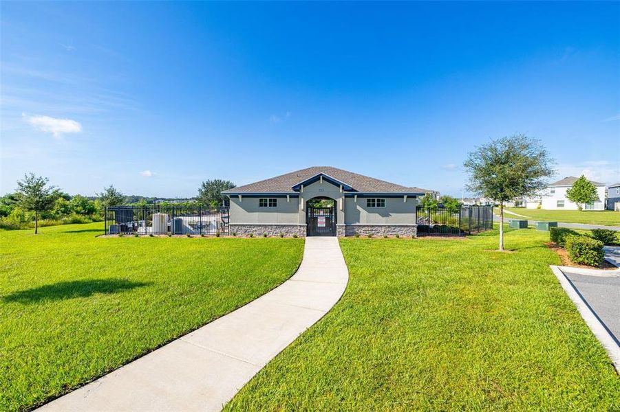 Front exterior of a new home in Peace Creek Reserve, Winter Haven, FL, highlighting curb appeal (Image 29).