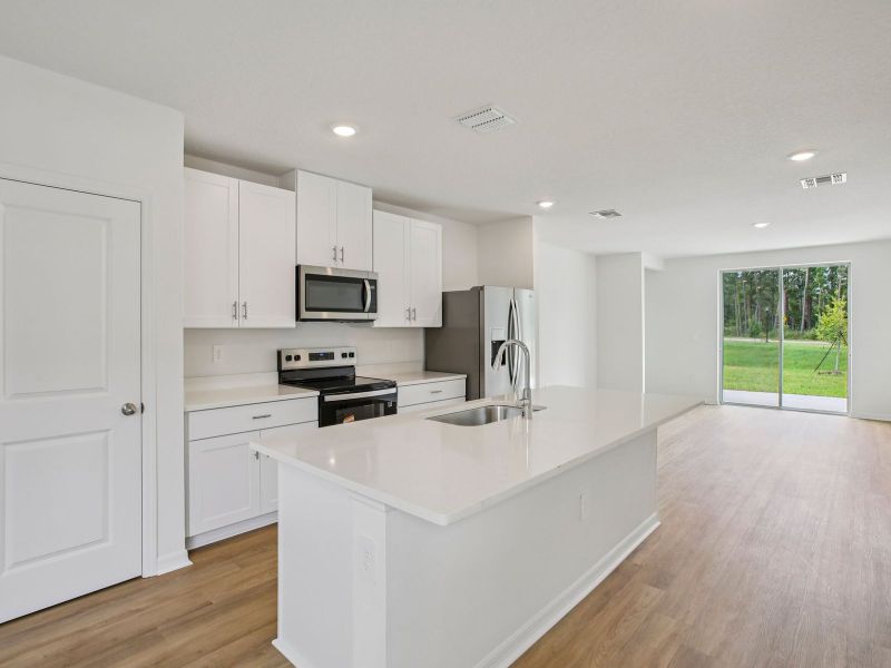 Furnished interior view inside a new home in Leyland Preserve - Premier Series, Brooksville (Image 4).
