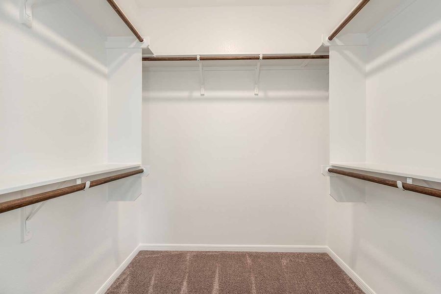 Representative unfurnished interior of a home built from the Newport by Omega Builders in Southern Pointe, College Station (Image 13).