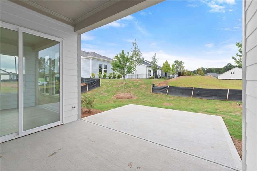 Exterior details and patio area of a home in The Reserve at Bells Ferry, Kennesaw (Image 28).