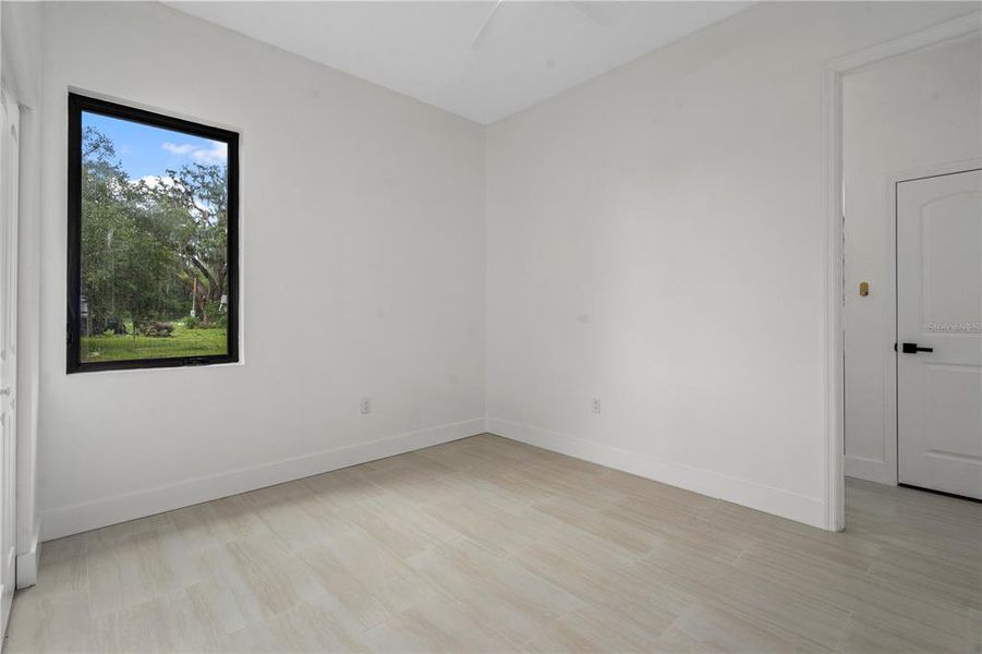 Spacious, unfurnished interior of a new home in , New Port Richey (Image 40).