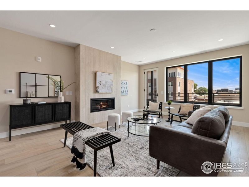 A feature fireplace fits perfectly in the center of this living room.