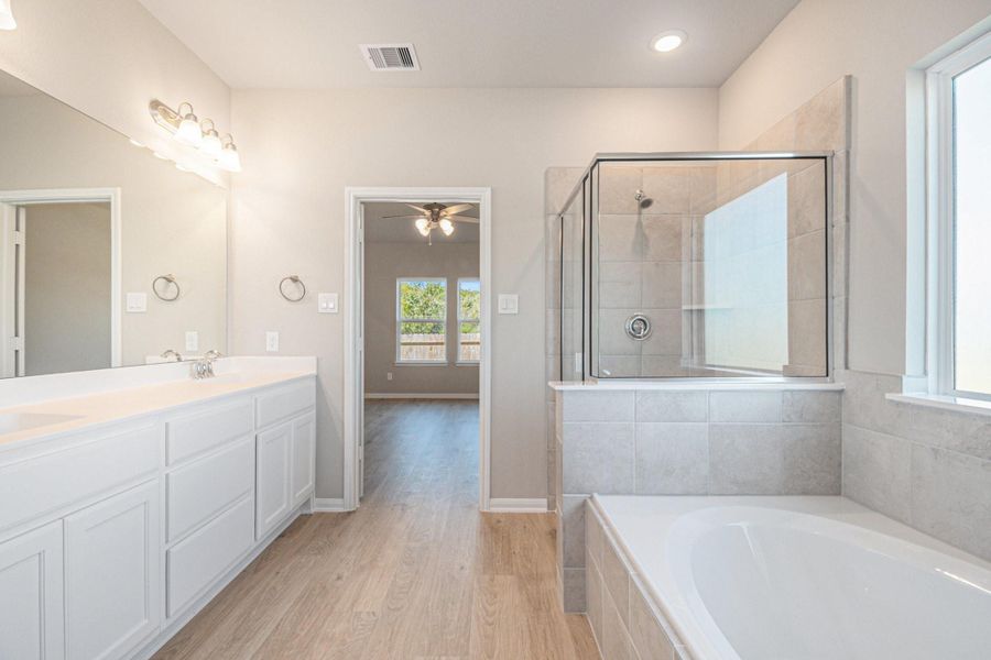 Furnished interior view inside a new home in Clear View Estates, Willis (Image 7).