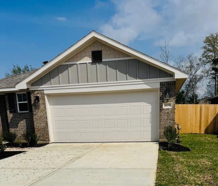 Front exterior of a new home in Grand Oaks Reserve, Cleveland, TX, highlighting curb appeal (Image 15).