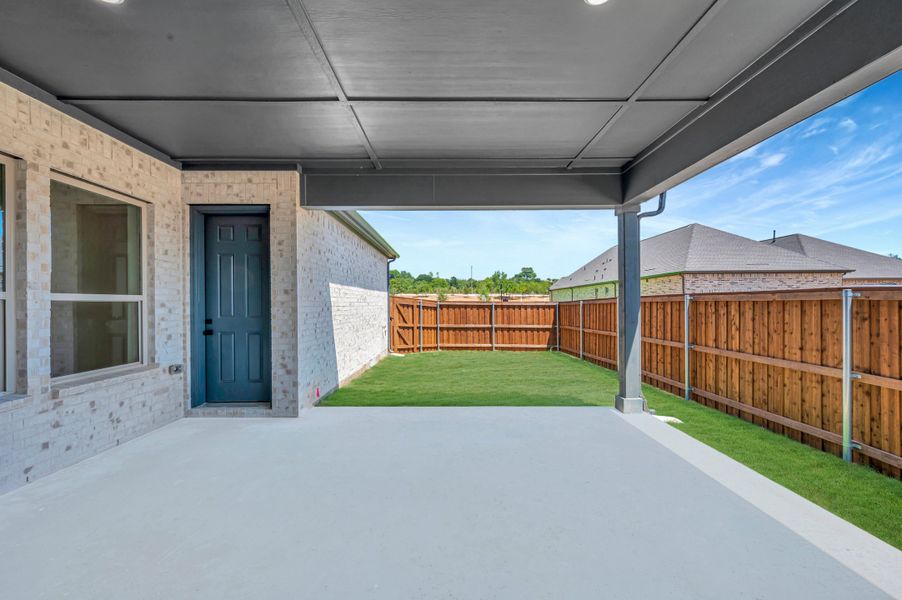 Exterior details and patio area of a home in Elements at Viridian - Traditional Series, Arlington (Image 22). Exterior details and patio area of a home in Elements at Viridian - Traditional Series, Arlington (Image 22).