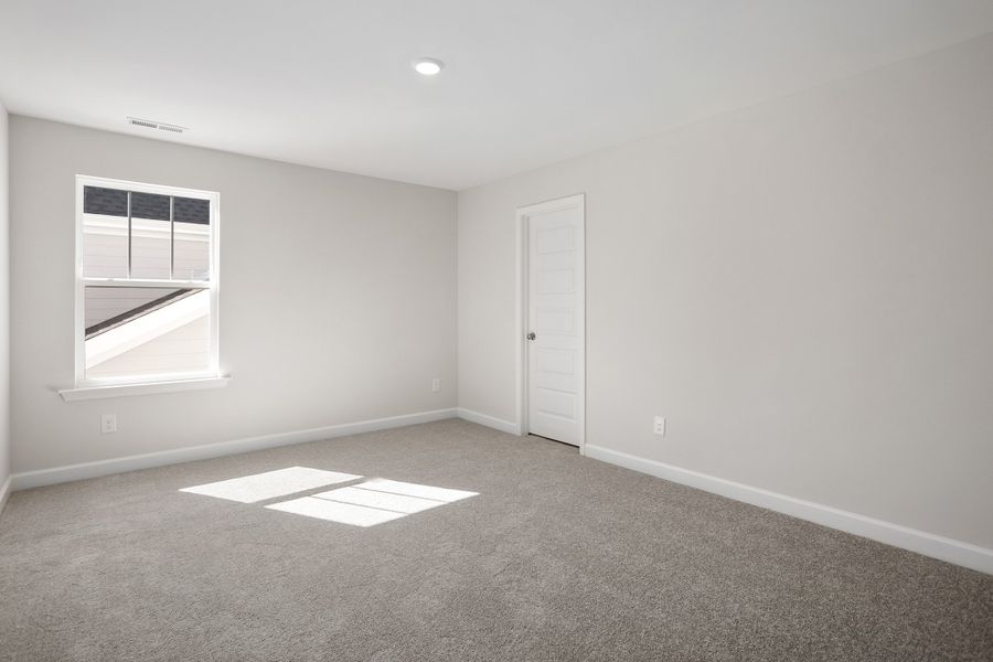 Spacious, unfurnished interior of a new home in Georgias Landing, Raleigh (Image 37).