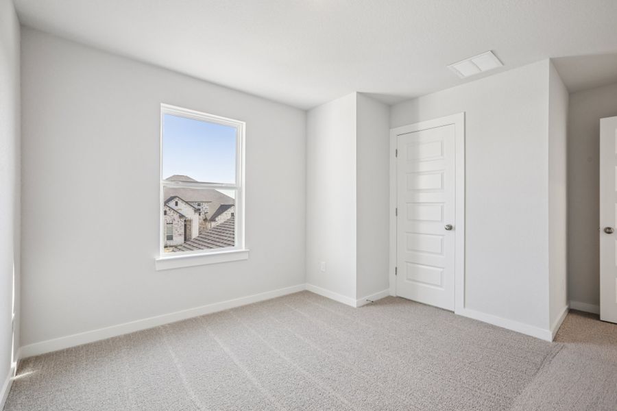 A room with white doors.