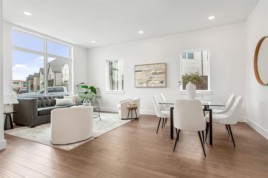 Dining room featuring plenty of natural light and hardwood / wood-style flooring