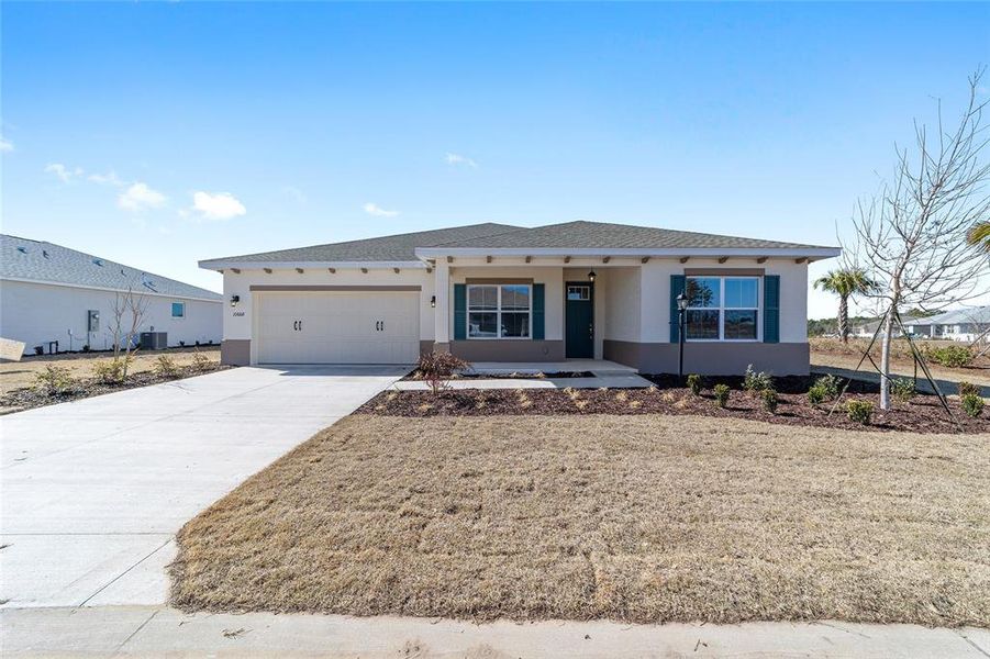 Front exterior of a new home in , Ocala, FL, highlighting curb appeal (Image 19).