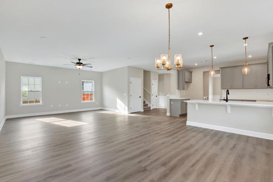 Oscar Mulberry Open-Concept Living Area – Ernest Homes