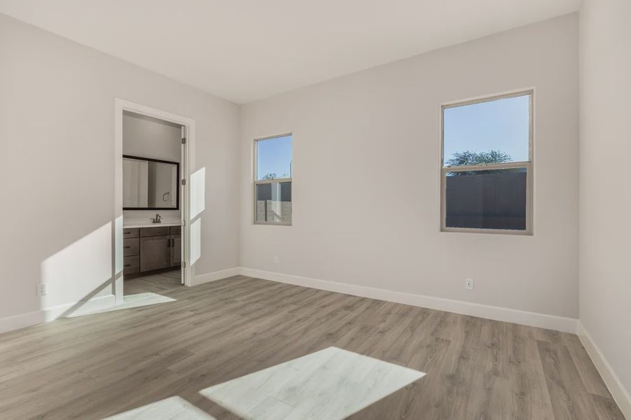 Spacious, unfurnished interior of a new home in Bellero Estates, Queen Creek (Image 31). Spacious, unfurnished interior of a new home in Bellero Estates, Queen Creek (Image 31).