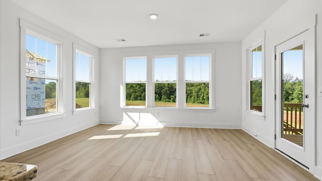 Spacious morning room seamlessly connected to the kitchen for easy entertaining at the Pinebrook community