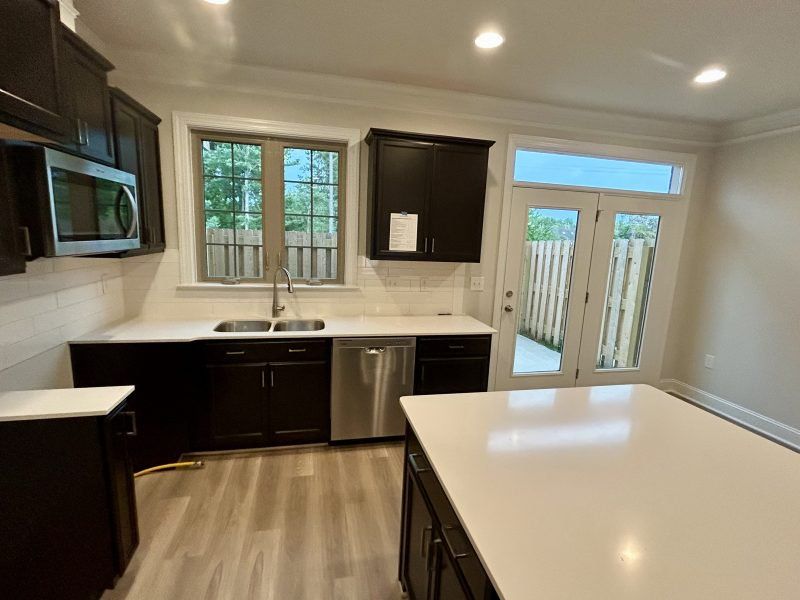 Furnished interior view inside a new home in Trellises, High Point (Image 5).