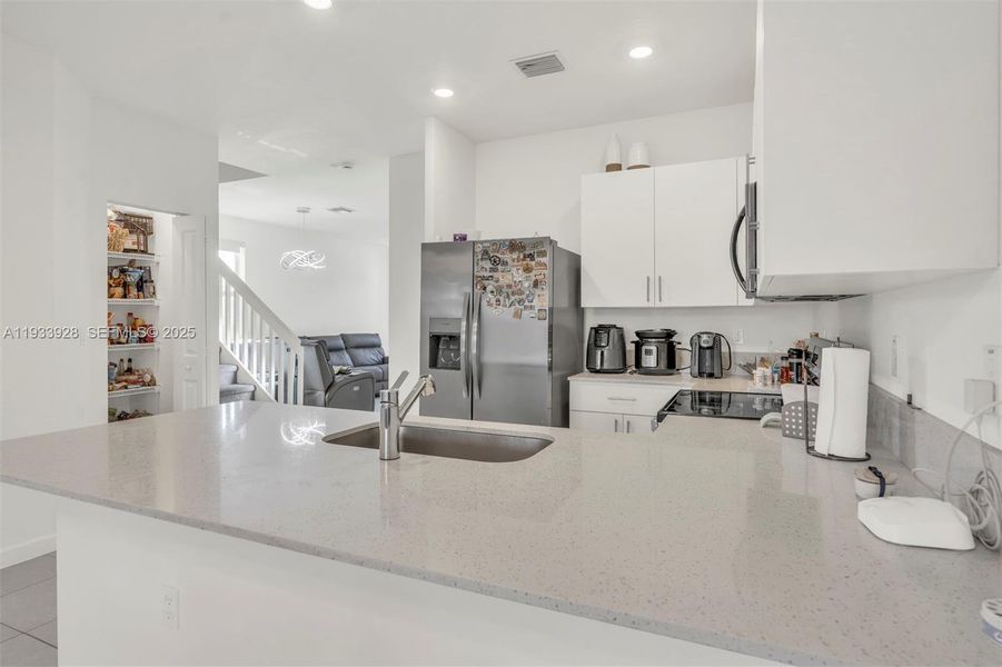 Furnished interior view inside a new home in , Coral Springs (Image 18).