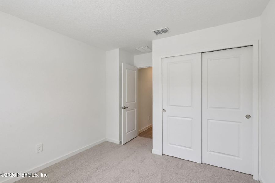Spacious, unfurnished interior of a new home in Colbert Landings, Palm Coast (Image 18). Spacious, unfurnished interior of a new home in Colbert Landings, Palm Coast (Image 18).