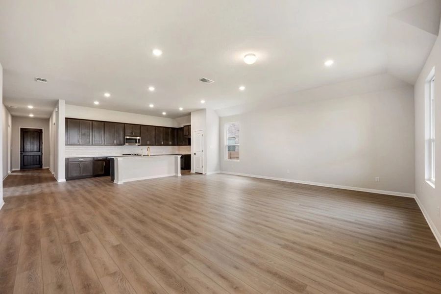 Spacious, unfurnished interior of a new home in The Colony 50s, Bastrop (Image 36).