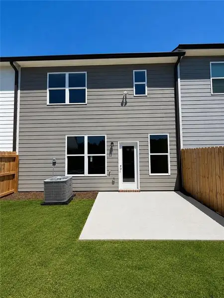 Exterior details and patio area of a home in Somerset at Riverbrook, Gainesville (Image 3).