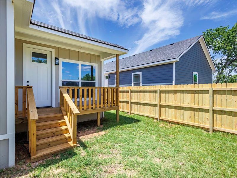 Exterior details and patio area of a home in , Brownwood (Image 12).