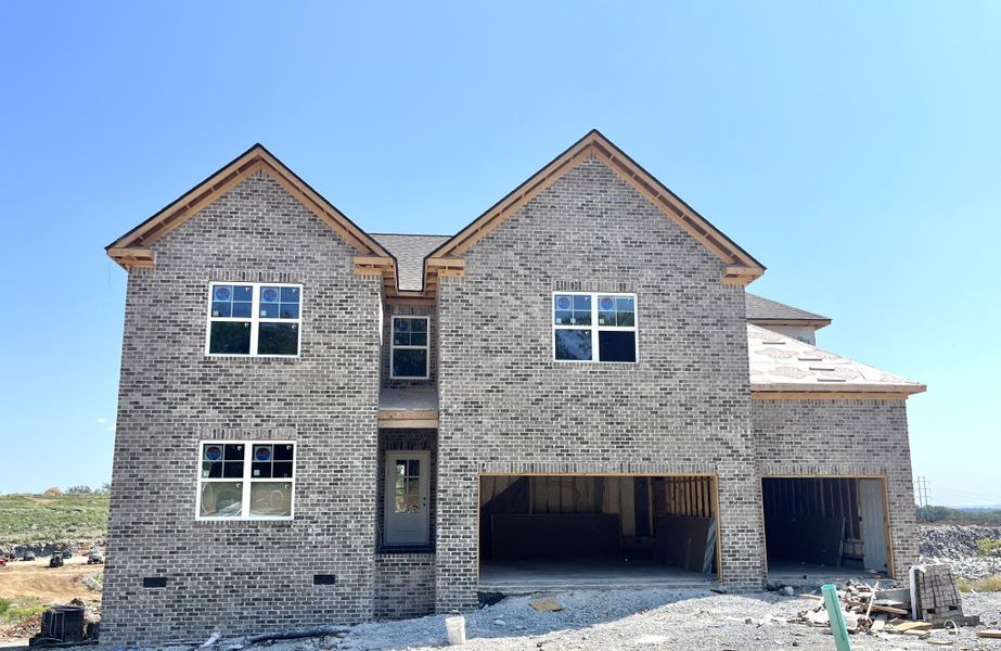 Stately 4 sides brick home.