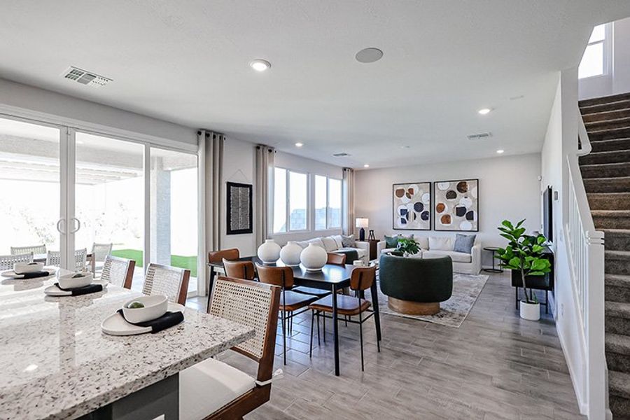 A room with a table and chairs. A room with a table and chairs.