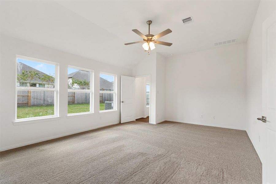 Spacious, unfurnished interior of a new home in Sunterra, Katy (Image 12).