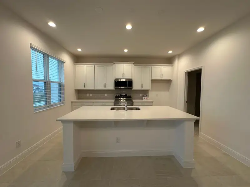 Furnished interior view inside a new home in Trinity Lakes, Groveland (Image 3).