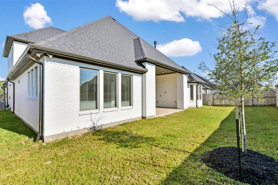 Exterior details and patio area of a home in , Manvel (Image 25).