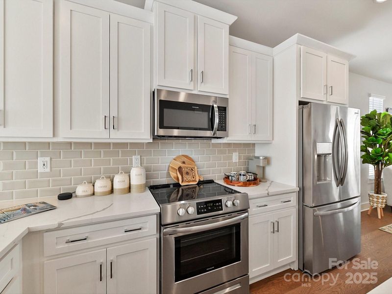 Furnished interior view inside a new home in LOSO Terraces, Charlotte (Image 8). Furnished interior view inside a new home in LOSO Terraces, Charlotte (Image 8).