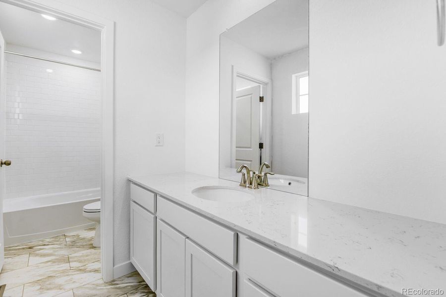 Furnished interior view inside a new home in Vermilion Creek, Centennial (Image 6).