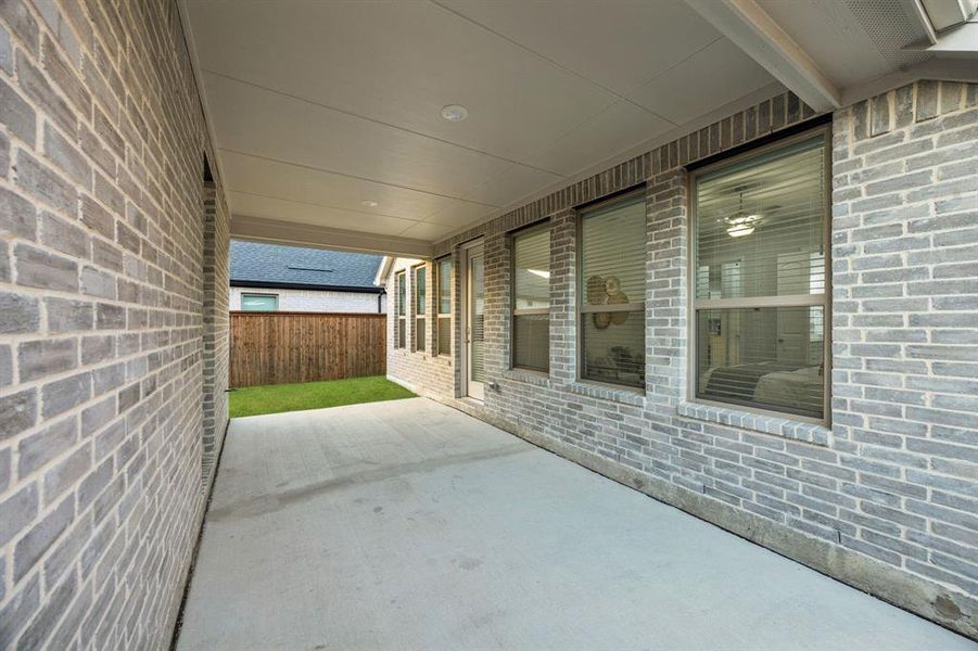 Exterior details and patio area of a home in Cambridge Crossing, Celina (Image 4).