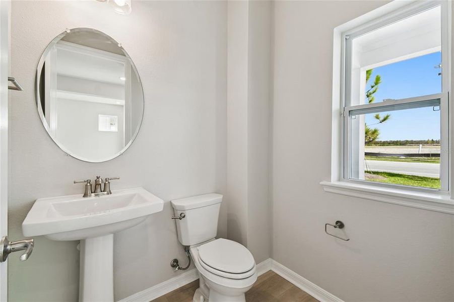 Furnished interior view inside a new home in Weslyn Park in Sunbridge 34', St. Cloud (Image 17).