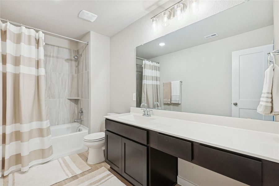 Furnished interior view inside a new home in , Willis (Image 13).