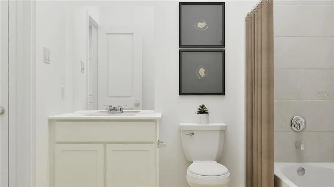 Furnished interior view inside a new home in Groves at Grenelefe: Classic Collection, Haines City (Image 9).