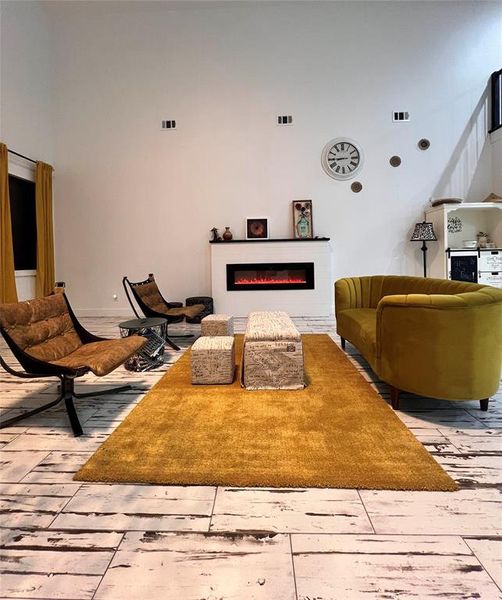 Living room with light wood-type flooring