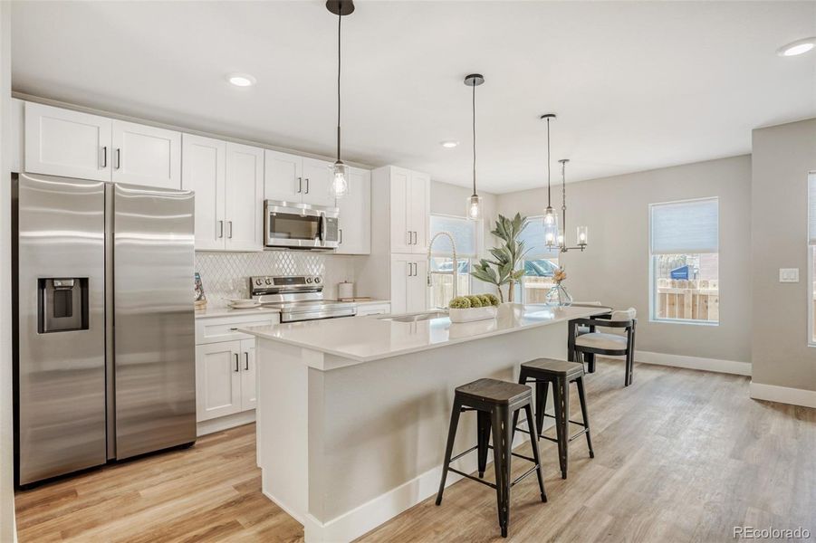 Furnished interior view inside a new home in , Wheat Ridge (Image 9).