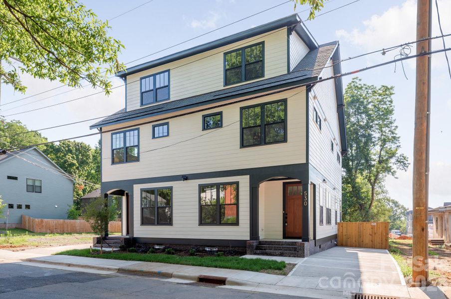 Front exterior of a new home in , Charlotte, NC, highlighting curb appeal (Image 1). Front exterior of a new home in , Charlotte, NC, highlighting curb appeal (Image 1).