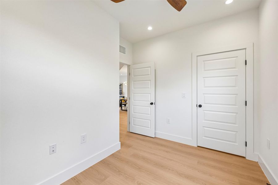 This first floor bedroom is pre-wired with GFiber internet to be used as a home office if desired.