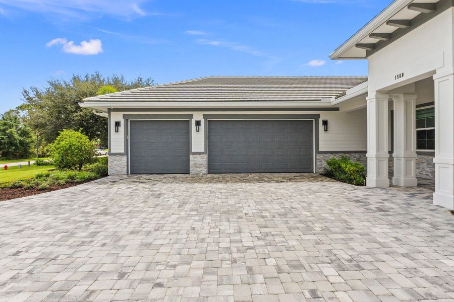 Front exterior of a new home in , Palm City, FL, highlighting curb appeal (Image 20).