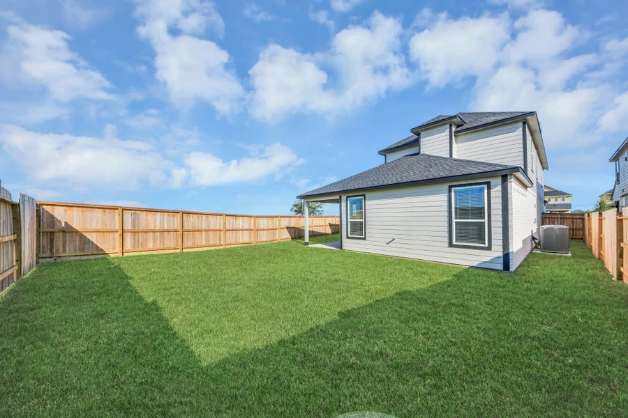 Backyard retreat, offering an abundance of space for kids to play and explore. The possibilities are endless in this outdoor haven, where the joy of open-air activities and family gatherings awaits. Backyard retreat, offering an abundance of space for kids to play and explore. The possibilities are endless in this outdoor haven, where the joy of open-air activities and family gatherings awaits.
