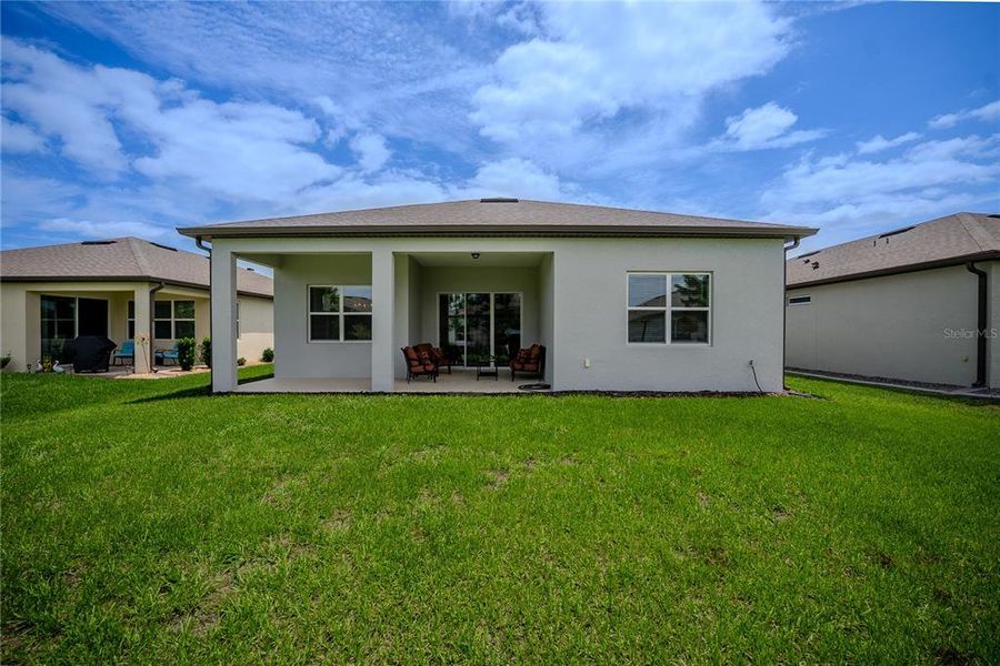 Exterior details and patio area of a home in Del Webb Stone Creek, Ocala (Image 30).