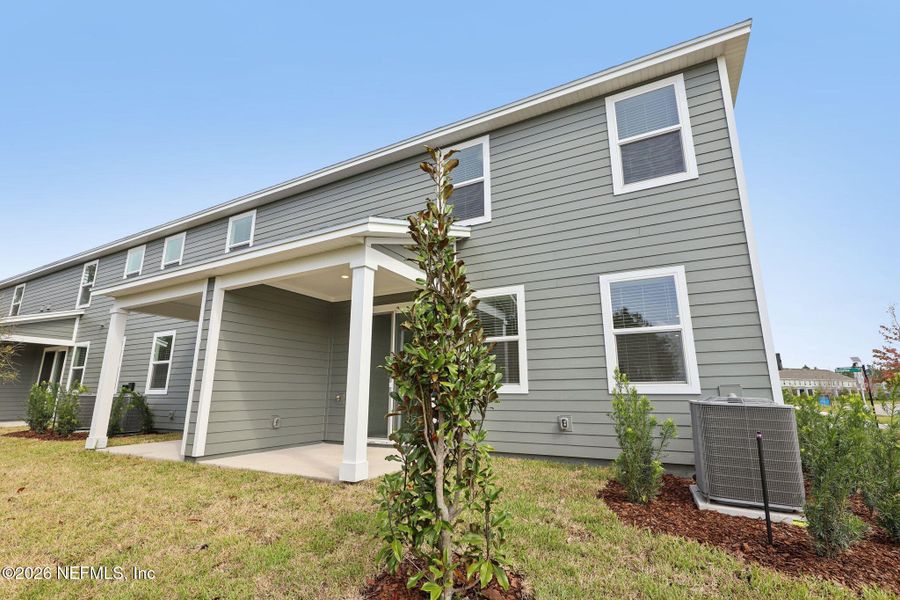Exterior details and patio area of a home in Parkside at Shearwater, St. Augustine (Image 3).