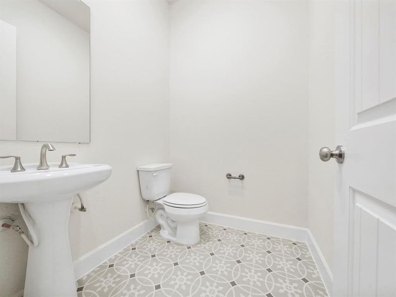 A conveniently located Powder Bath on the first floor adds a touch of elegance and practicality to your urban dwelling.