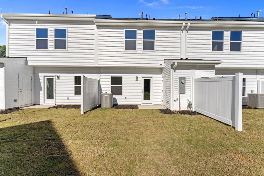 Exterior details and patio area of a home in Edwards Station, Taylors (Image 2).