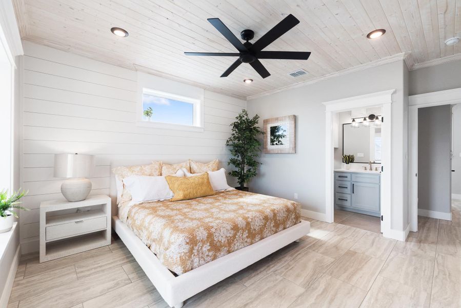Bedroom with wood ceiling, crown molding, recessed lighting, and ensuite bathroom Bedroom with wood ceiling, crown molding, recessed lighting, and ensuite bathroom