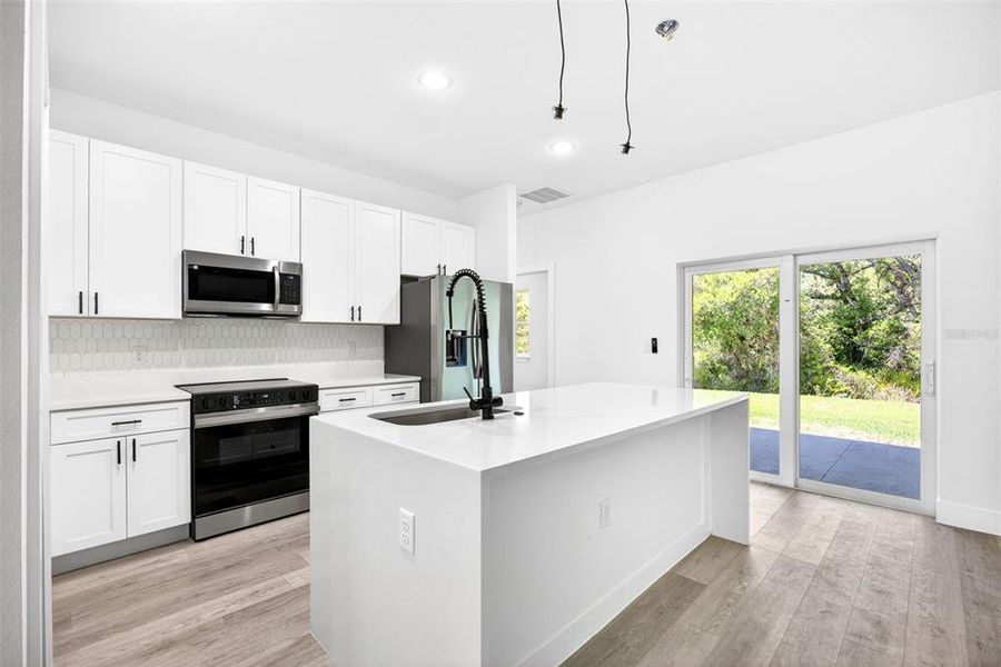 Furnished interior view inside a new home in , Port Charlotte (Image 7).